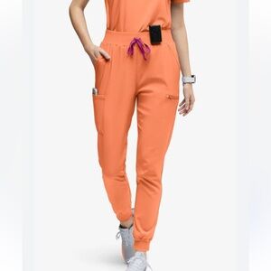 Figs Women's Vibrant Orange Jogger Scrub Pants